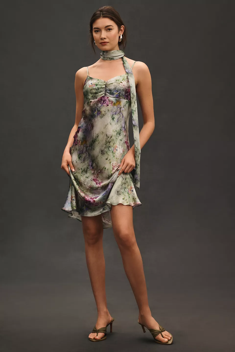 A light-green and purple printed slip dress with a neck-scarf detail