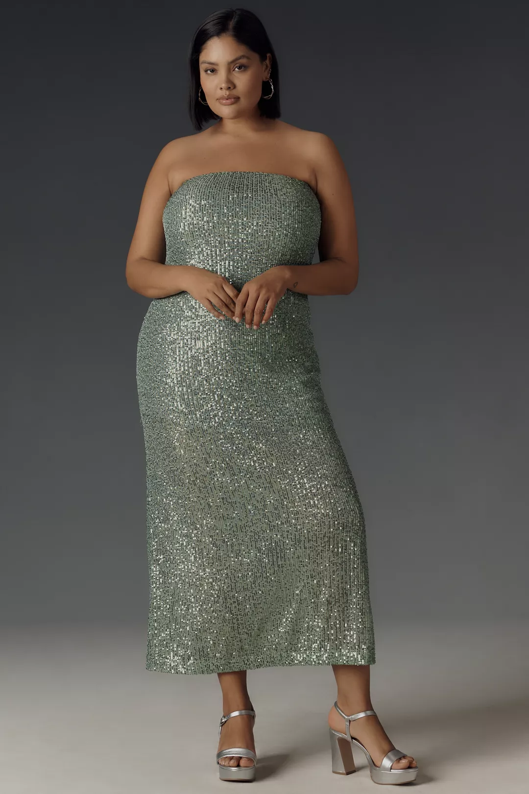 A plus-size strapless sequin midi dress