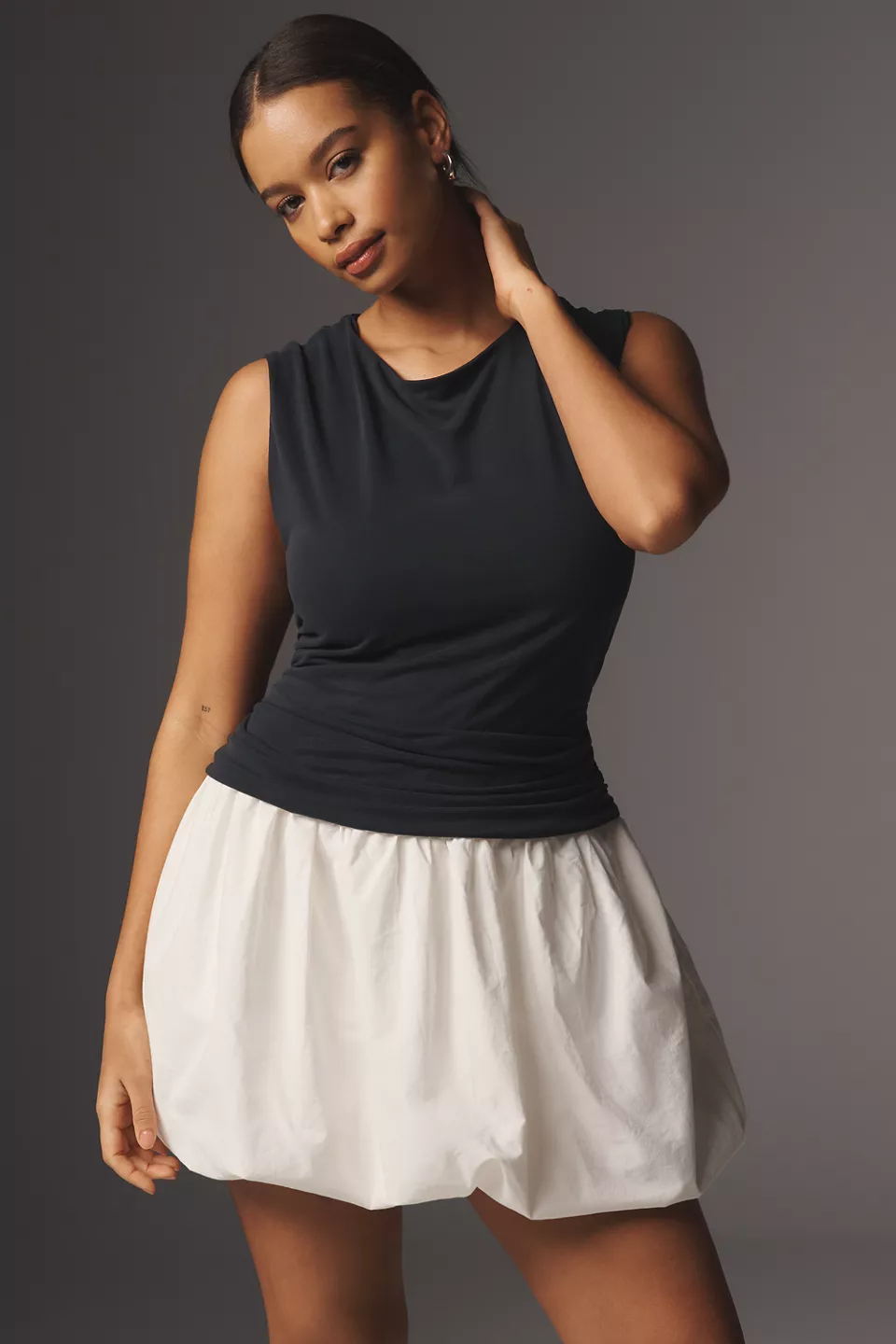 A plus-size, black-and-white, twofer bubble dress
