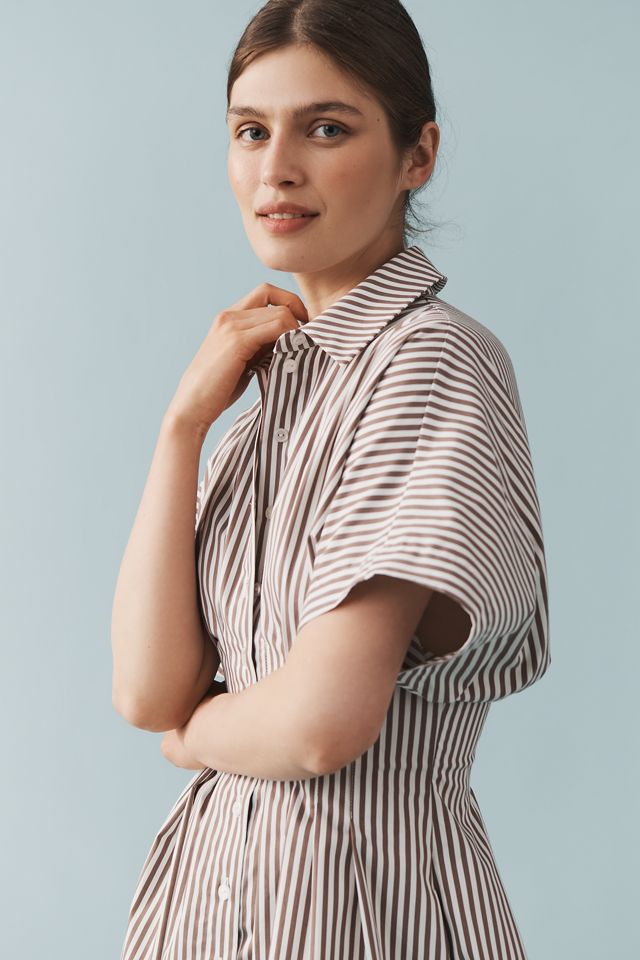 The @heynasreen Tobie Button-Front Pleated Mini Shirt Dress by Exquise