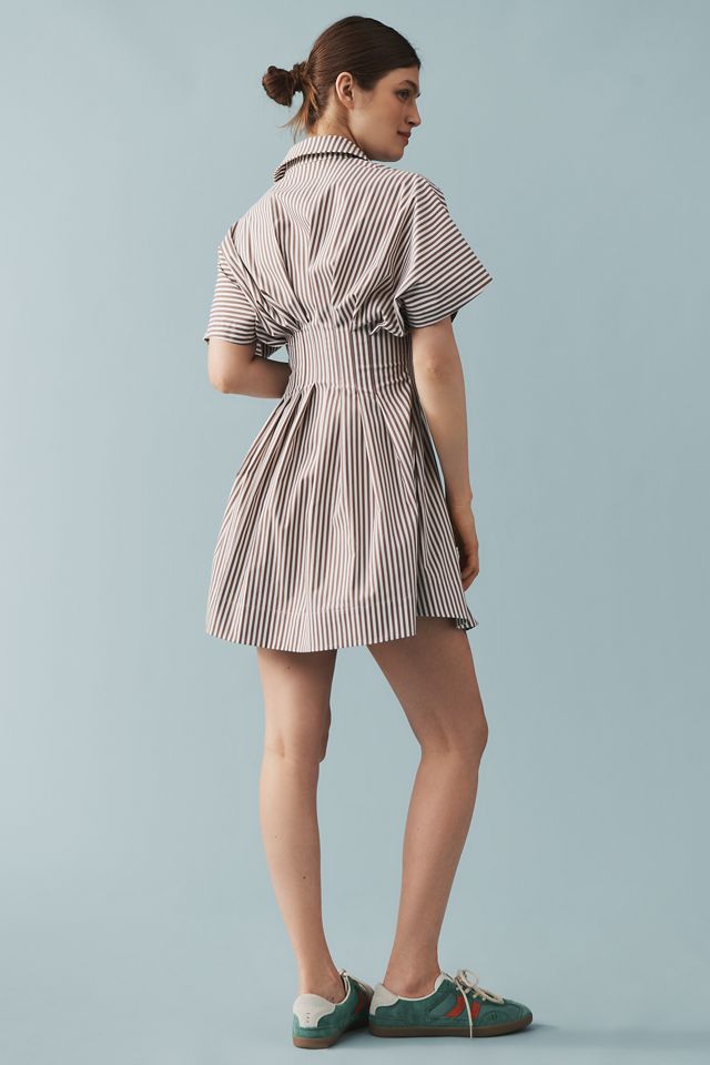 The @heynasreen Tobie Button-Front Pleated Mini Shirt Dress by Exquise