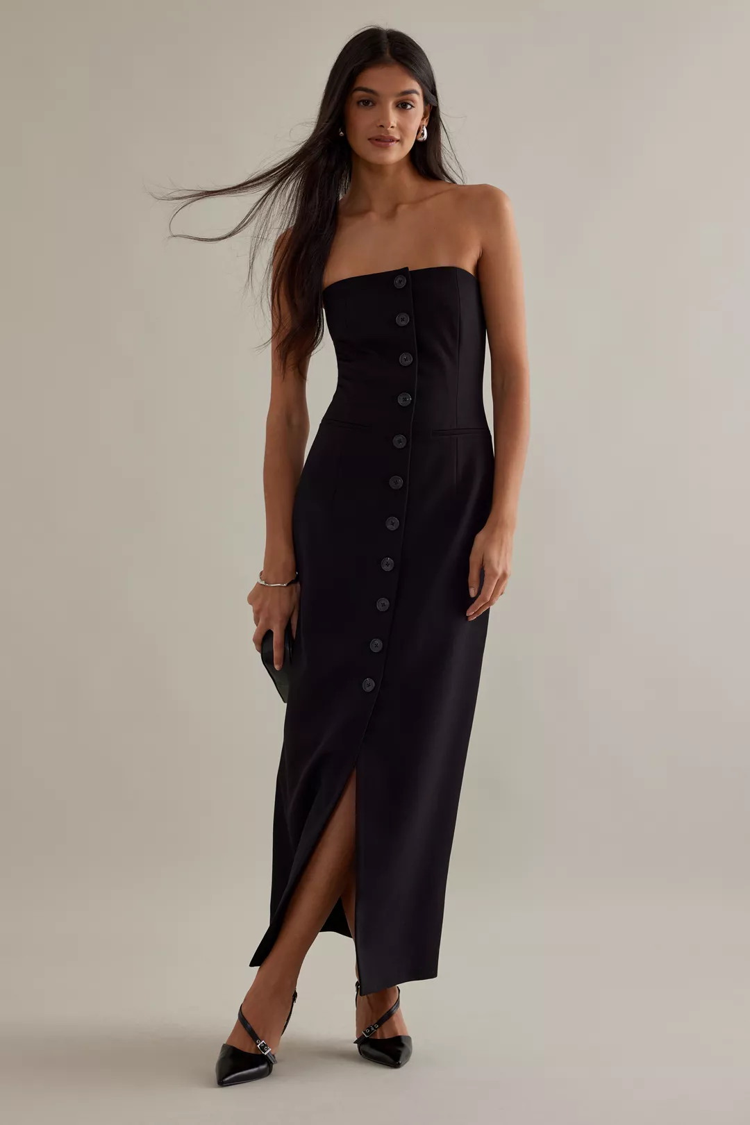 Aligne black Slim Maxi bandeau silhouette dress that falls to the ankles with front buttoning detail. 