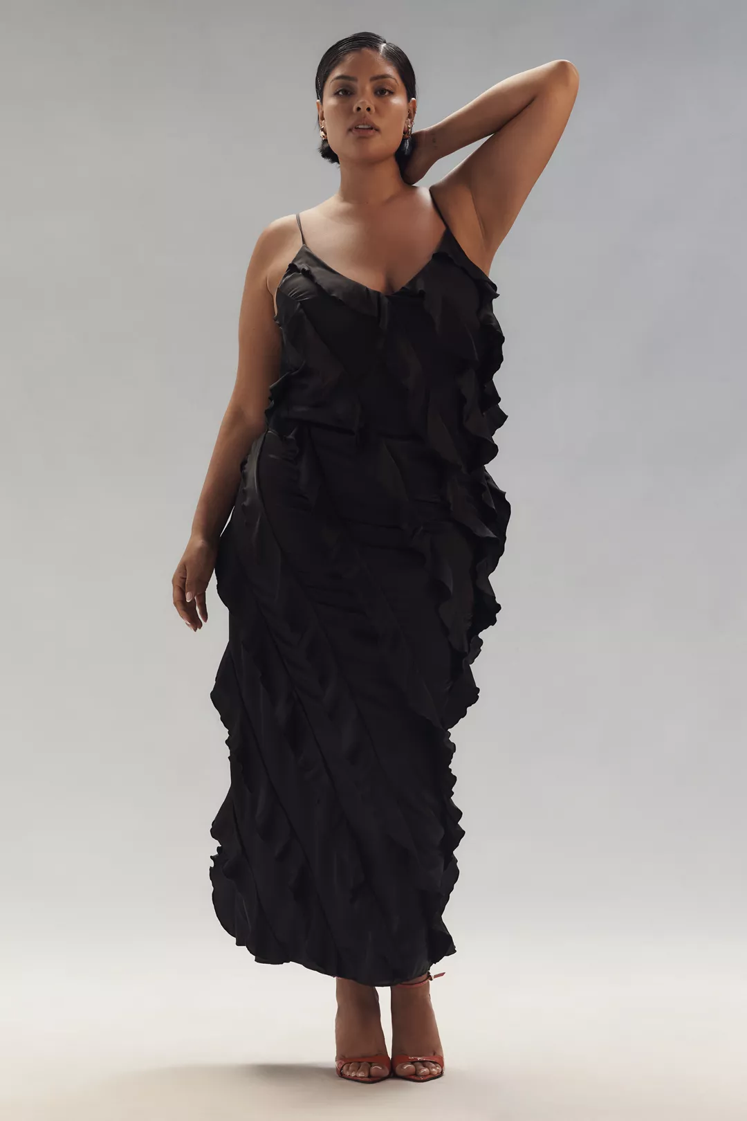 A plus-size black ruffled maxi dress
