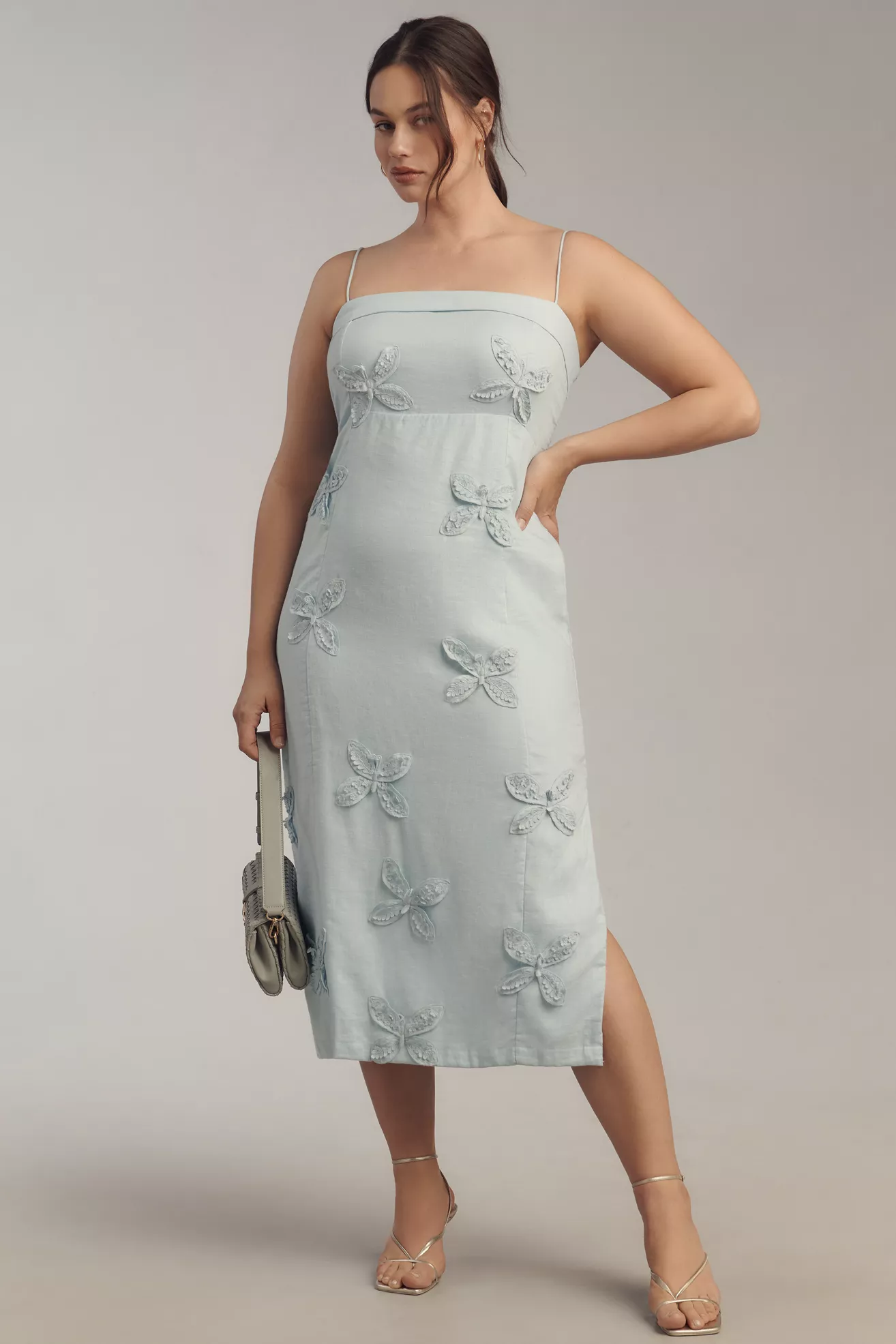 A plus-size, light-blue, floral-applique, linen midi dress