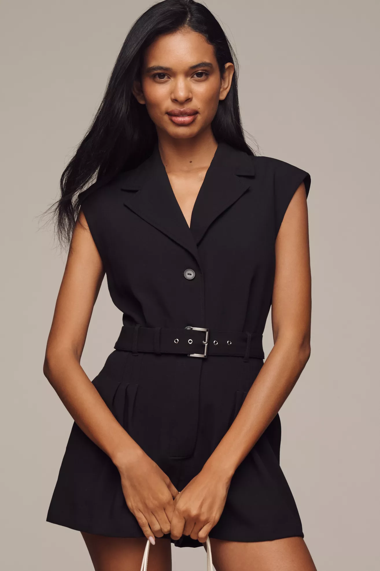 A black, button-up romper