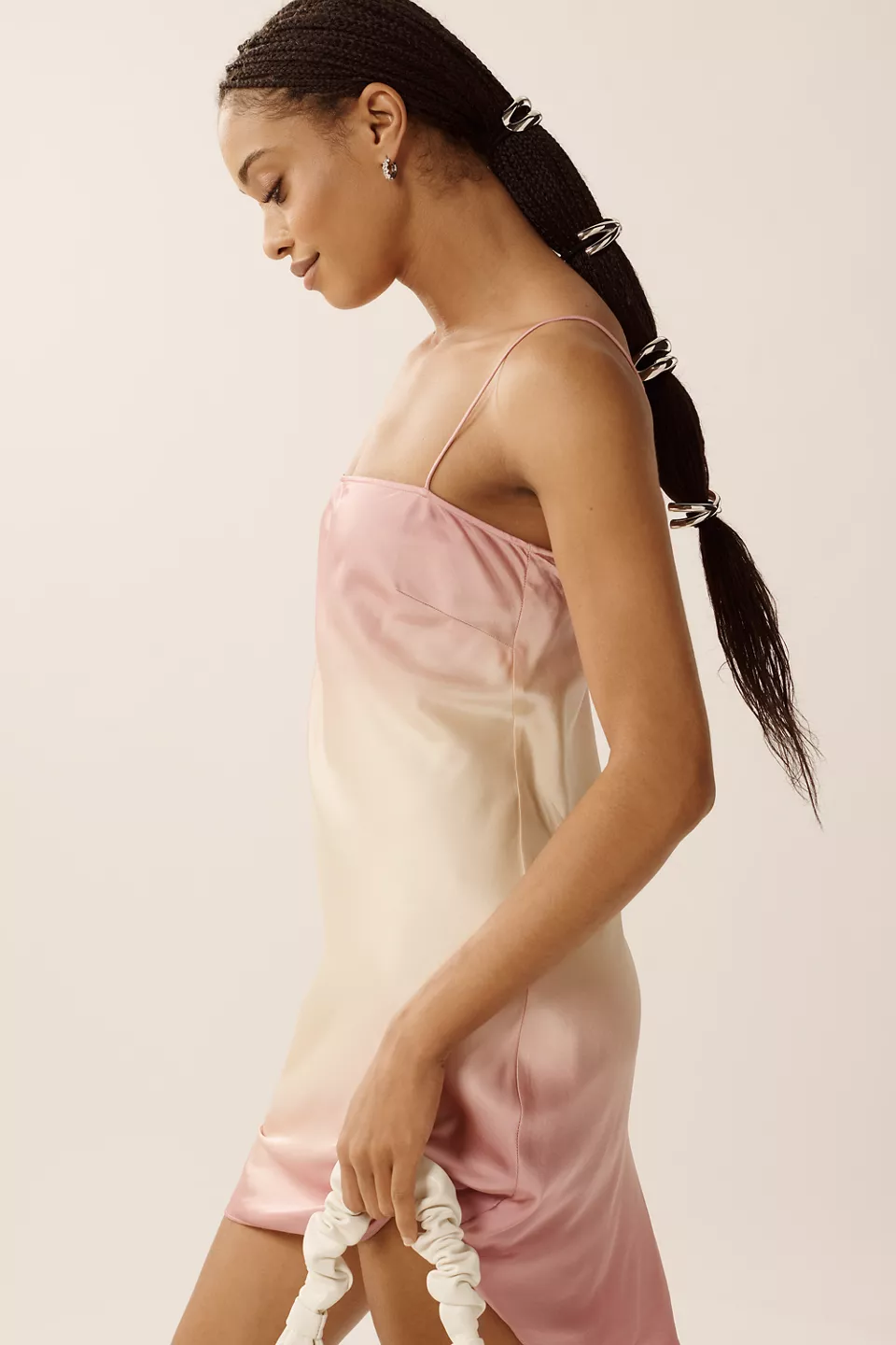 A light-pink-and-white mini slip dress
