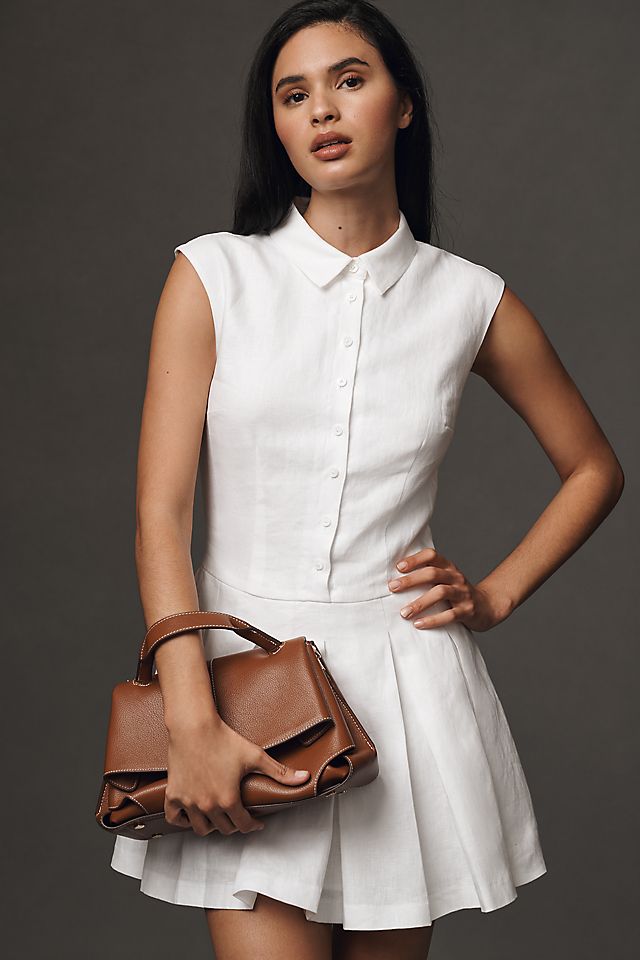 reformation white linen dress Daria Mini Sleeveless Bow Corset in The Belgium Has A Fitted Bodice With A Relaxed Skirt. Reformation Arella Linen Mini Dress