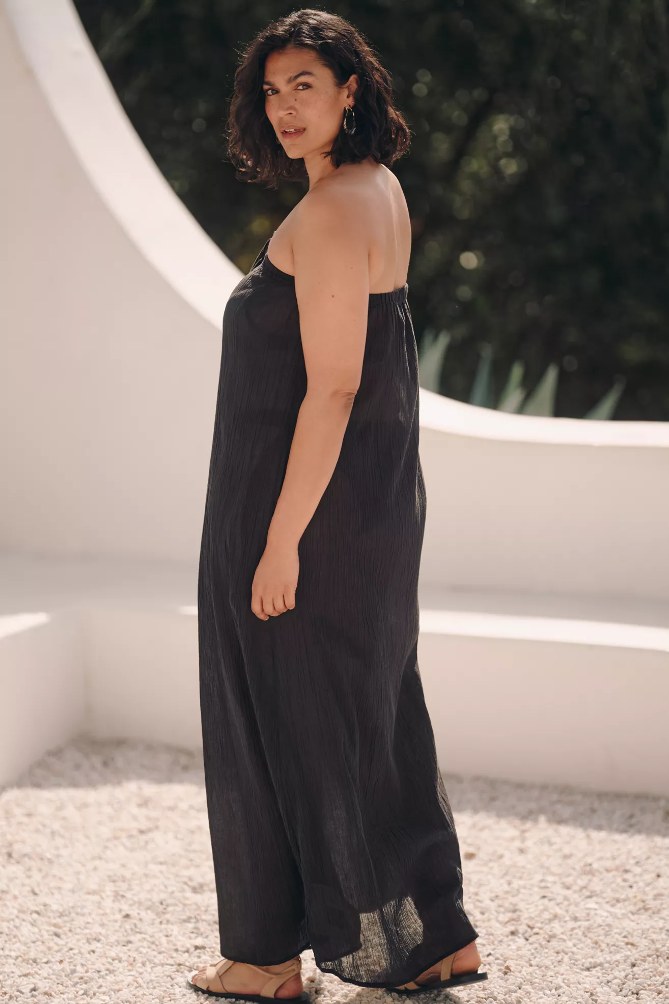 A plus-size, strapless, black, maxi dress swim cover-up