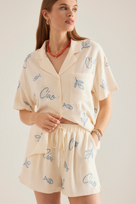 Chemise de surf en lin mélangé brodé blanc plat par taille: M/L chez Anthropologie - Flat White - Modalova