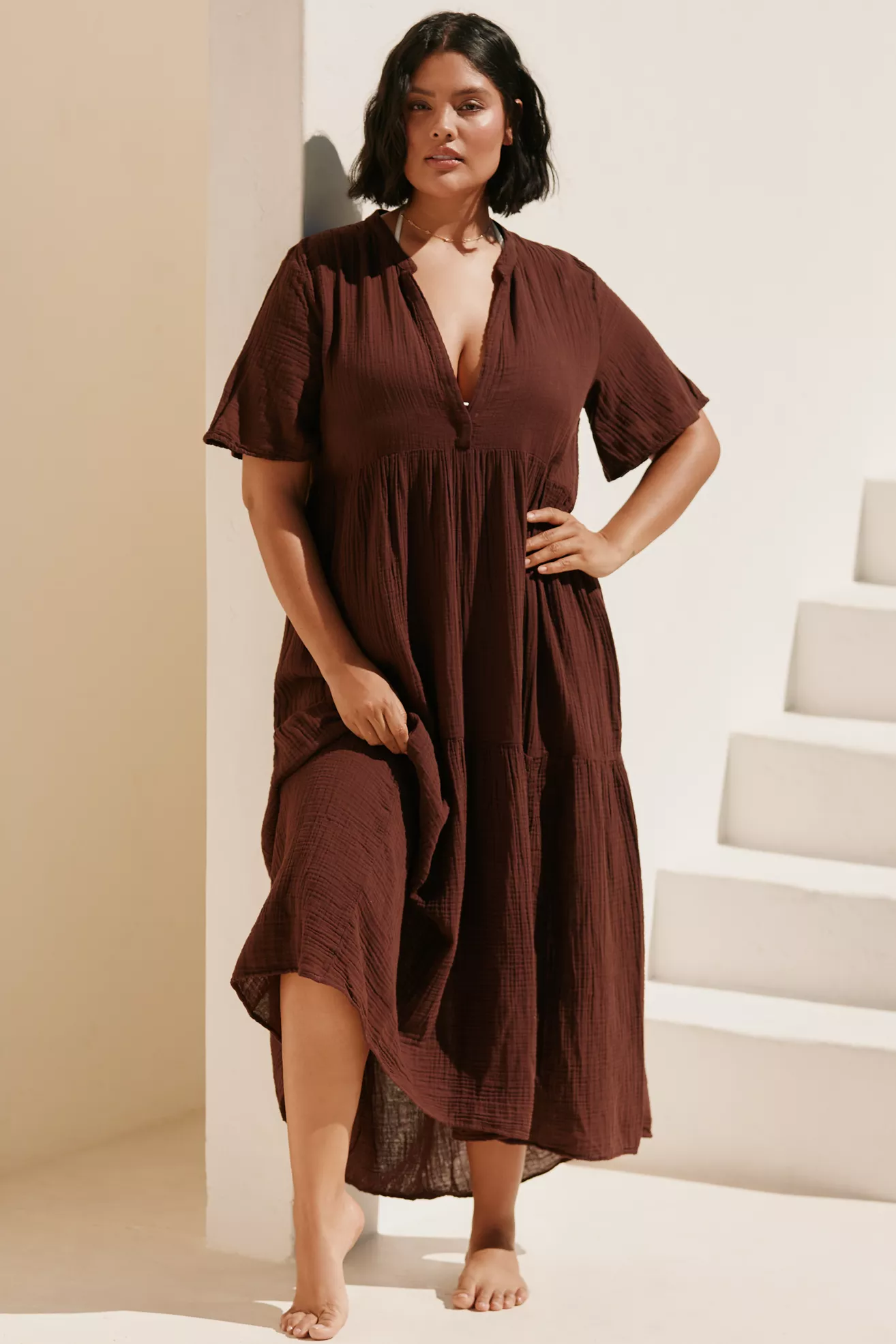 A plus-size, chocolate brown, flowy dress