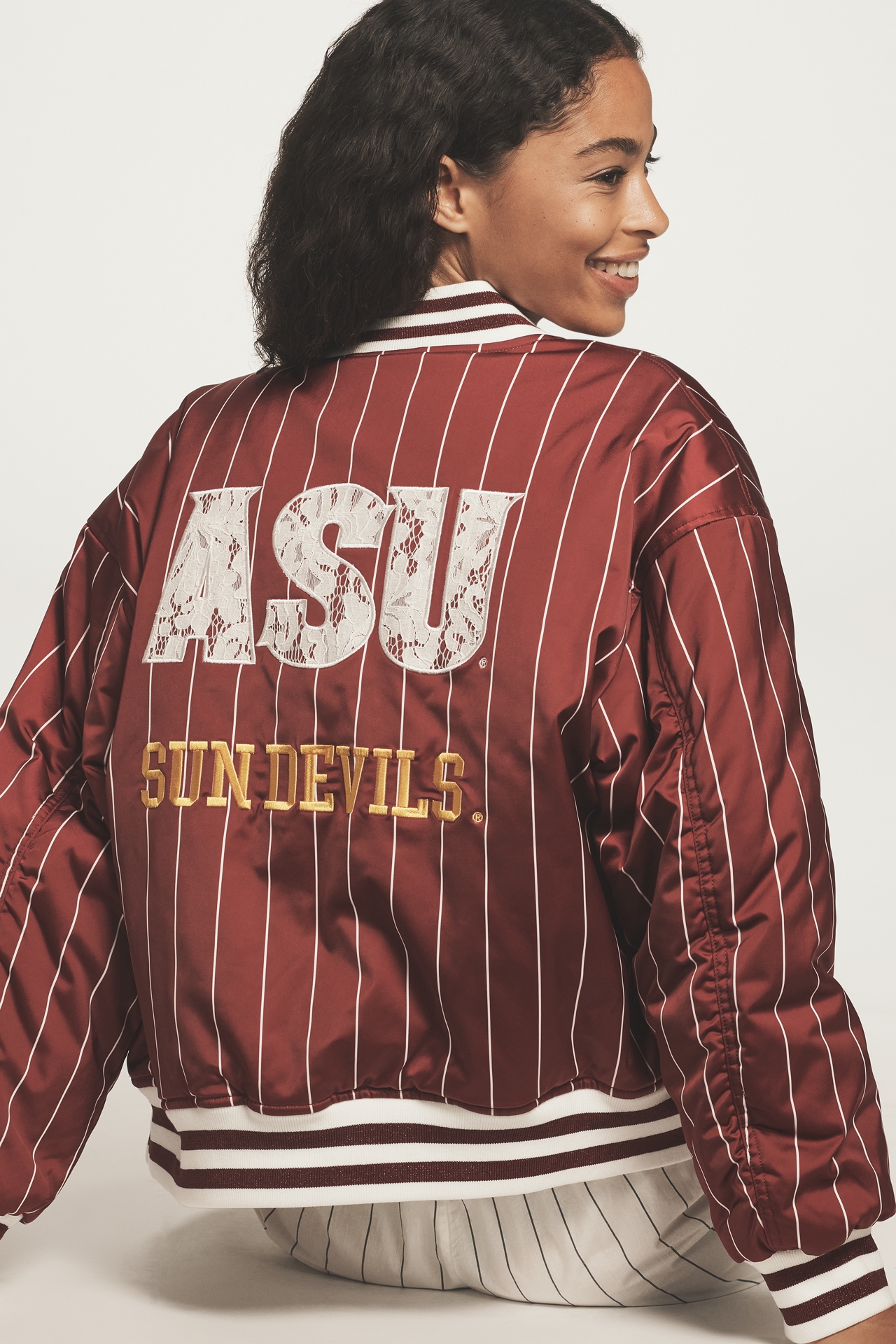 The Wild Collective x Anthropologie NCAA Bomber Jacket
