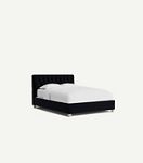 Black velvet bed with white bedding