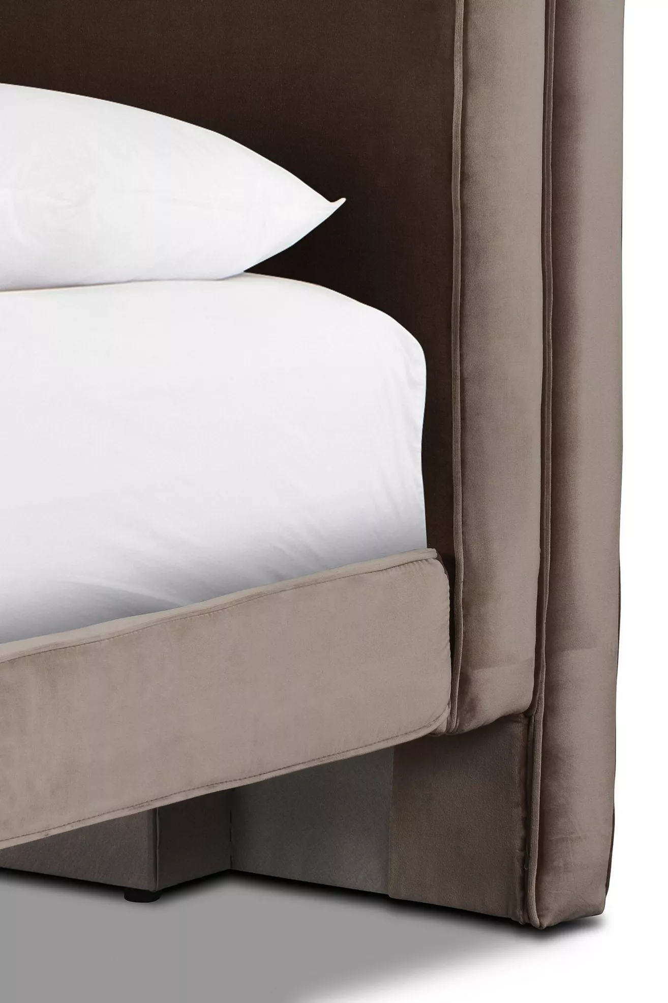 Close-up of corner with pillow and upholstery