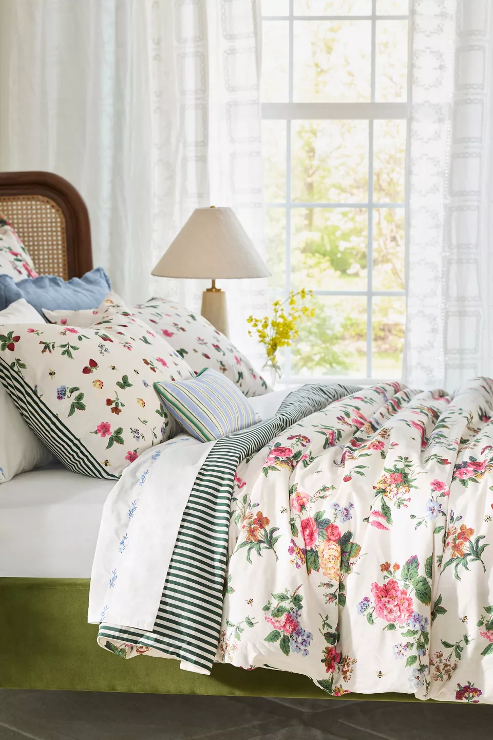 Anthropologie Printed Cotton-Slub Duvet Cover with soft floral pattern styled on a bed