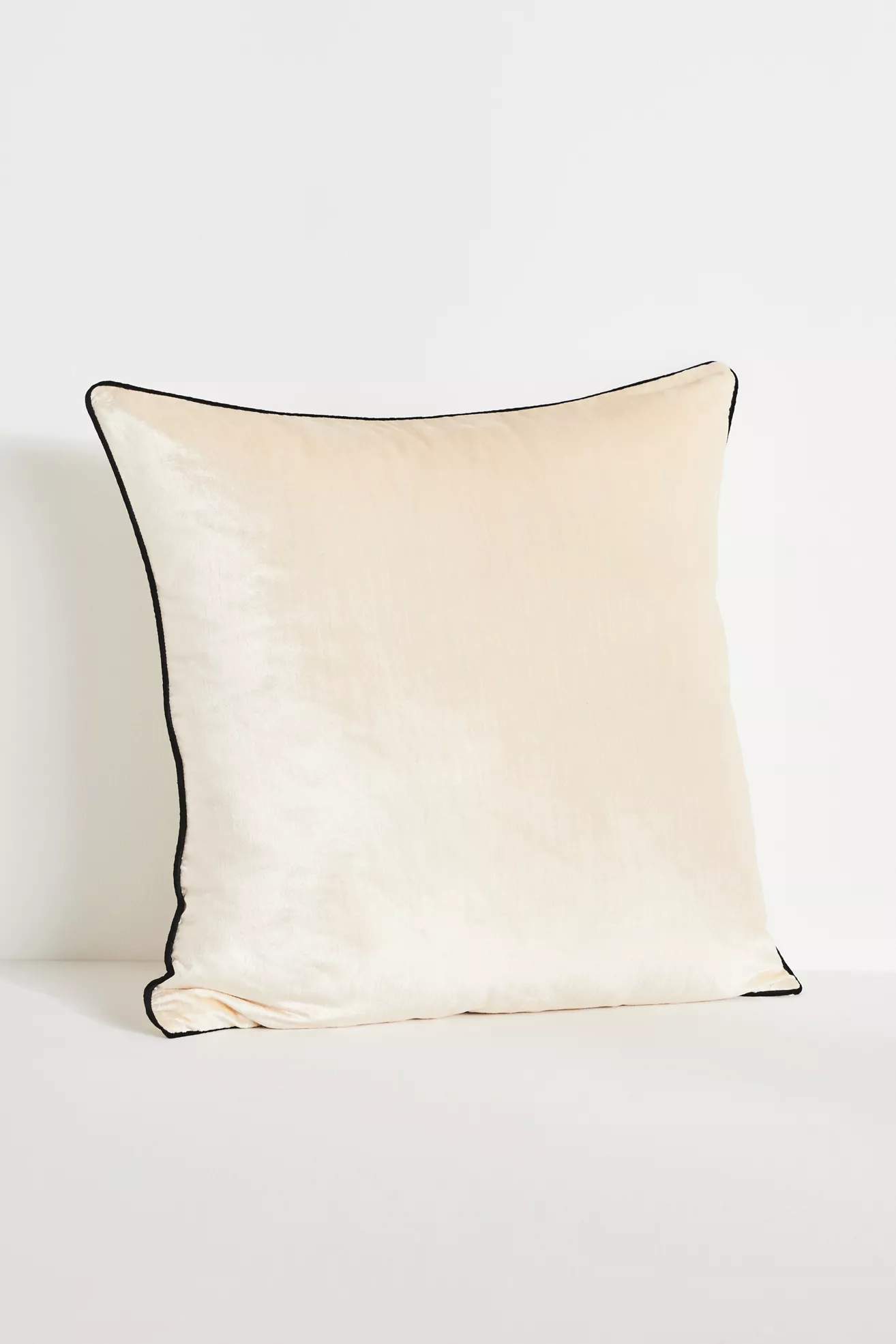 Cream velvet square pillow with black piping