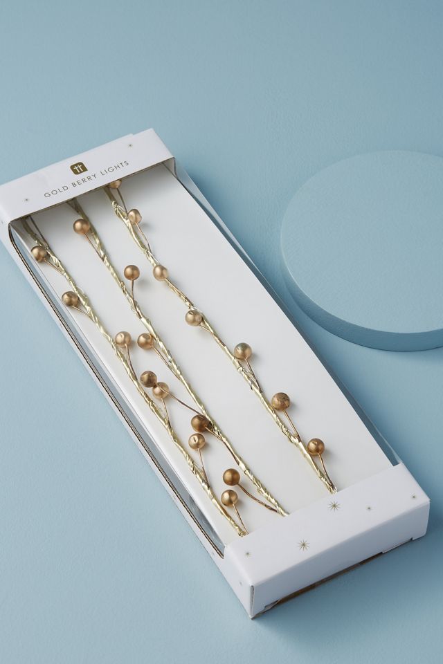 Lumières avec baies dorées