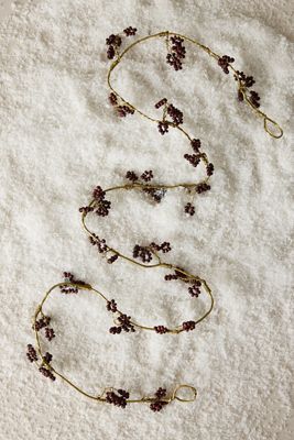 nkuku Tanu Perlengirlande