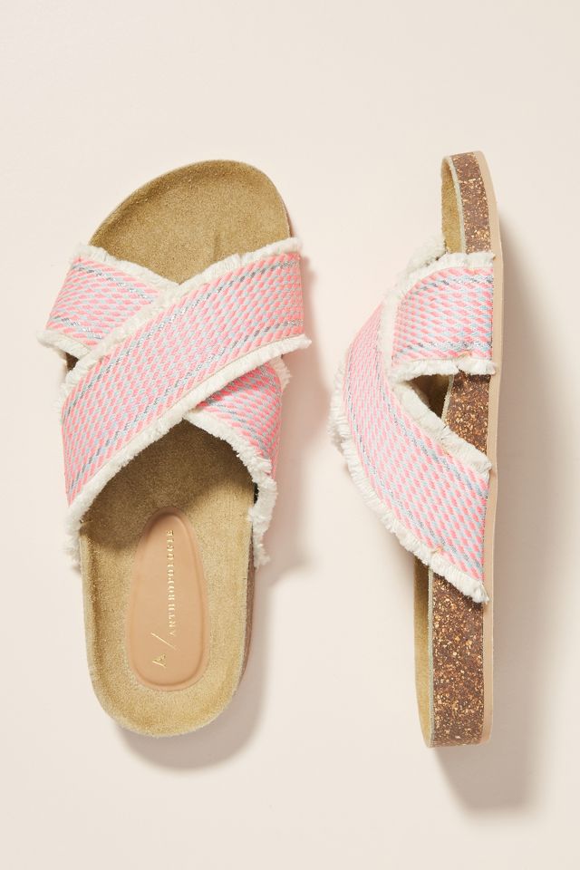 Pink criss cross store slides