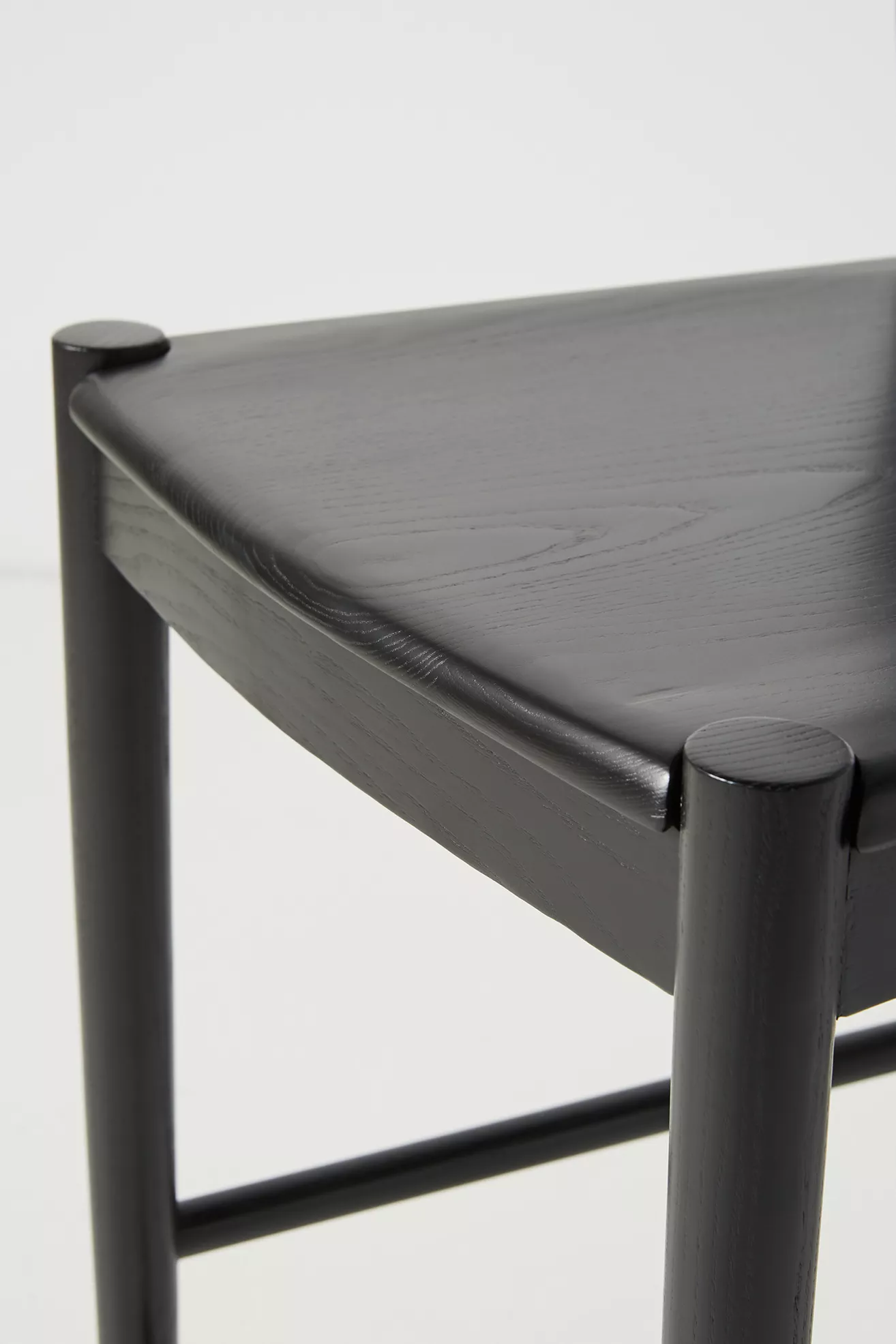 Close-up of leg joint and lower support rail