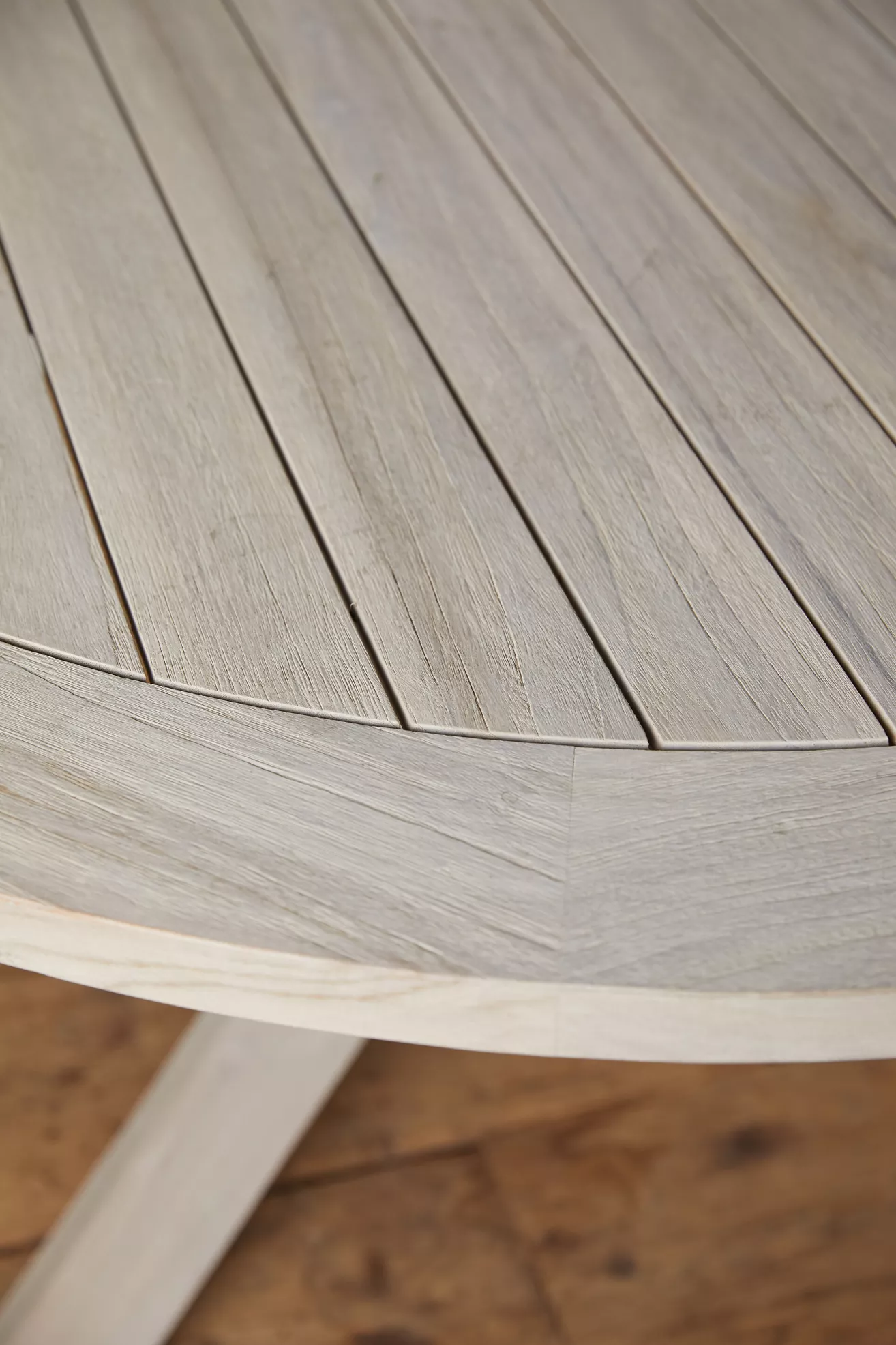 Close-up of slatted tabletop showing grain and finish