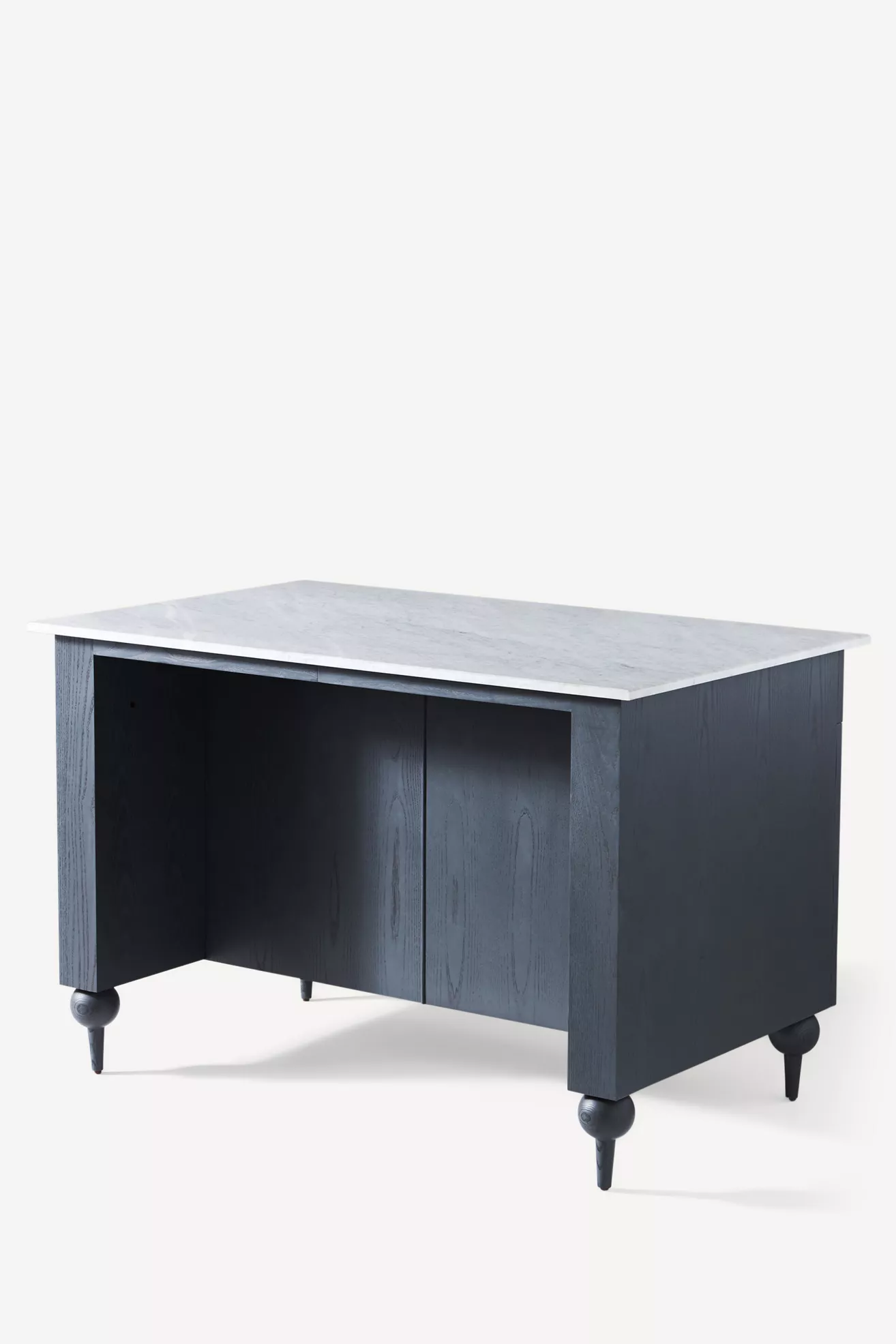 Side view of dark blue kitchen island