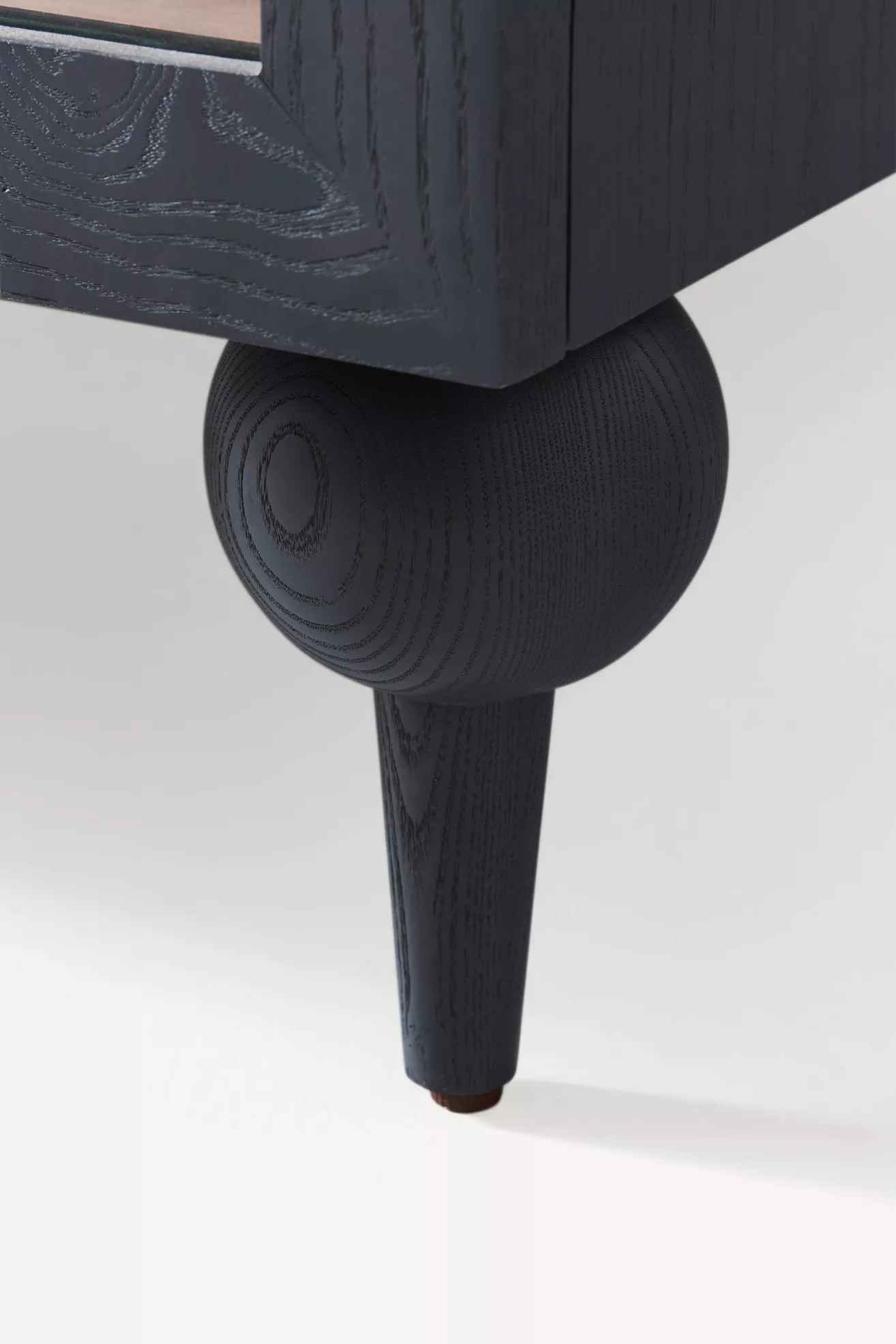 Navy cabinet leg with rounded foot