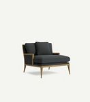 Grey chaise with matching cushions and wooden frame in room