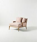 Pink chaise with one side showing armrest and back cushions
