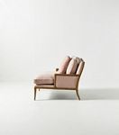 Side profile of pink chaise and wooden frame