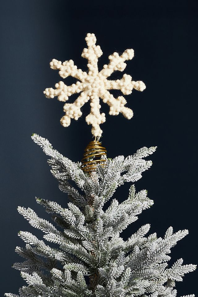 Snowflake store tree topper