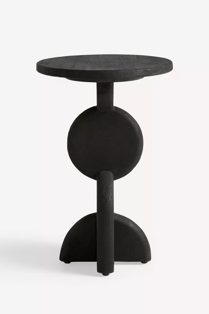 Modern small bedside table with round top and cantilever legs. C-table has cylinder foot -- very unusual!