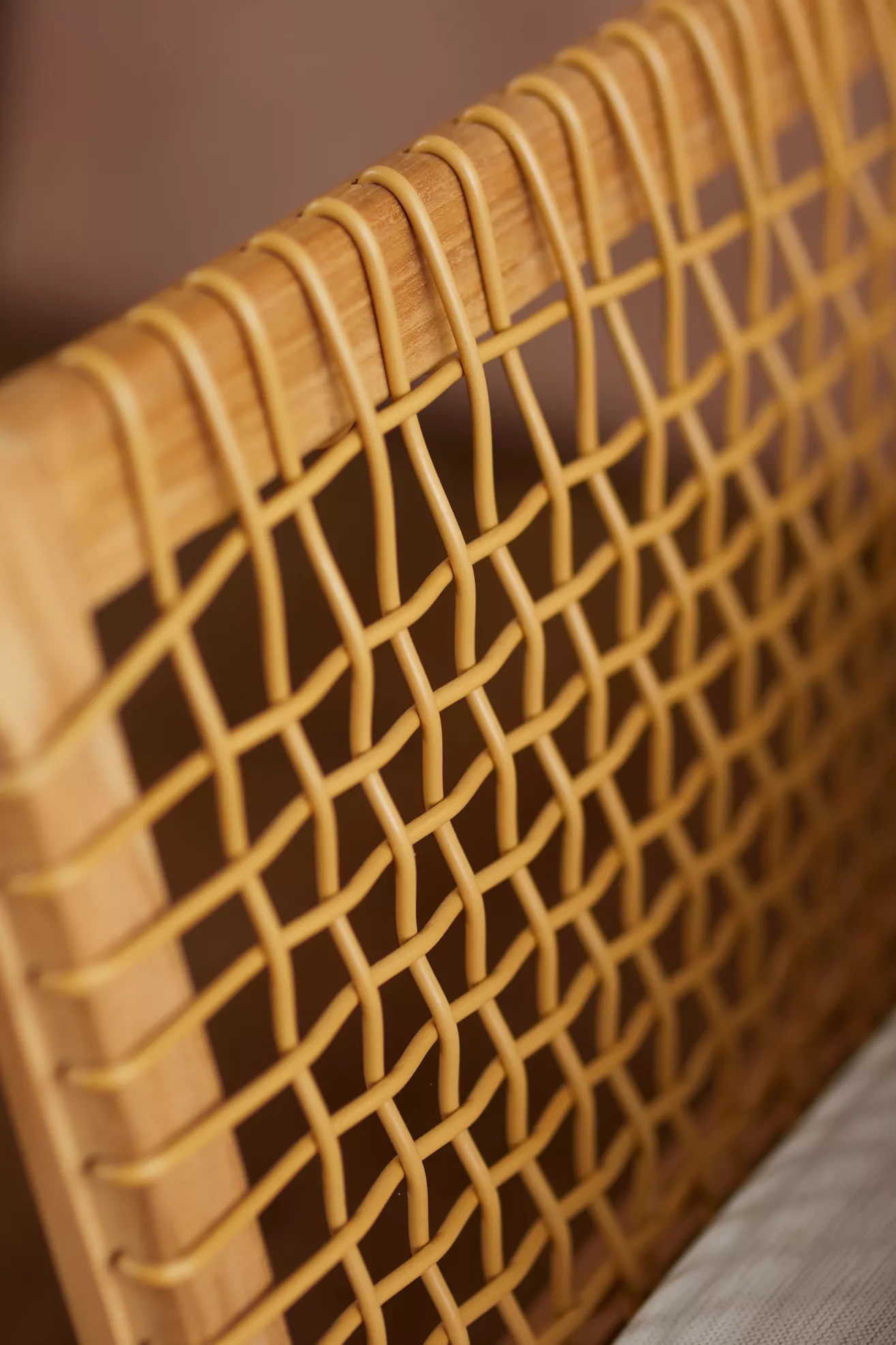Woven wooden frame detail with lattice pattern