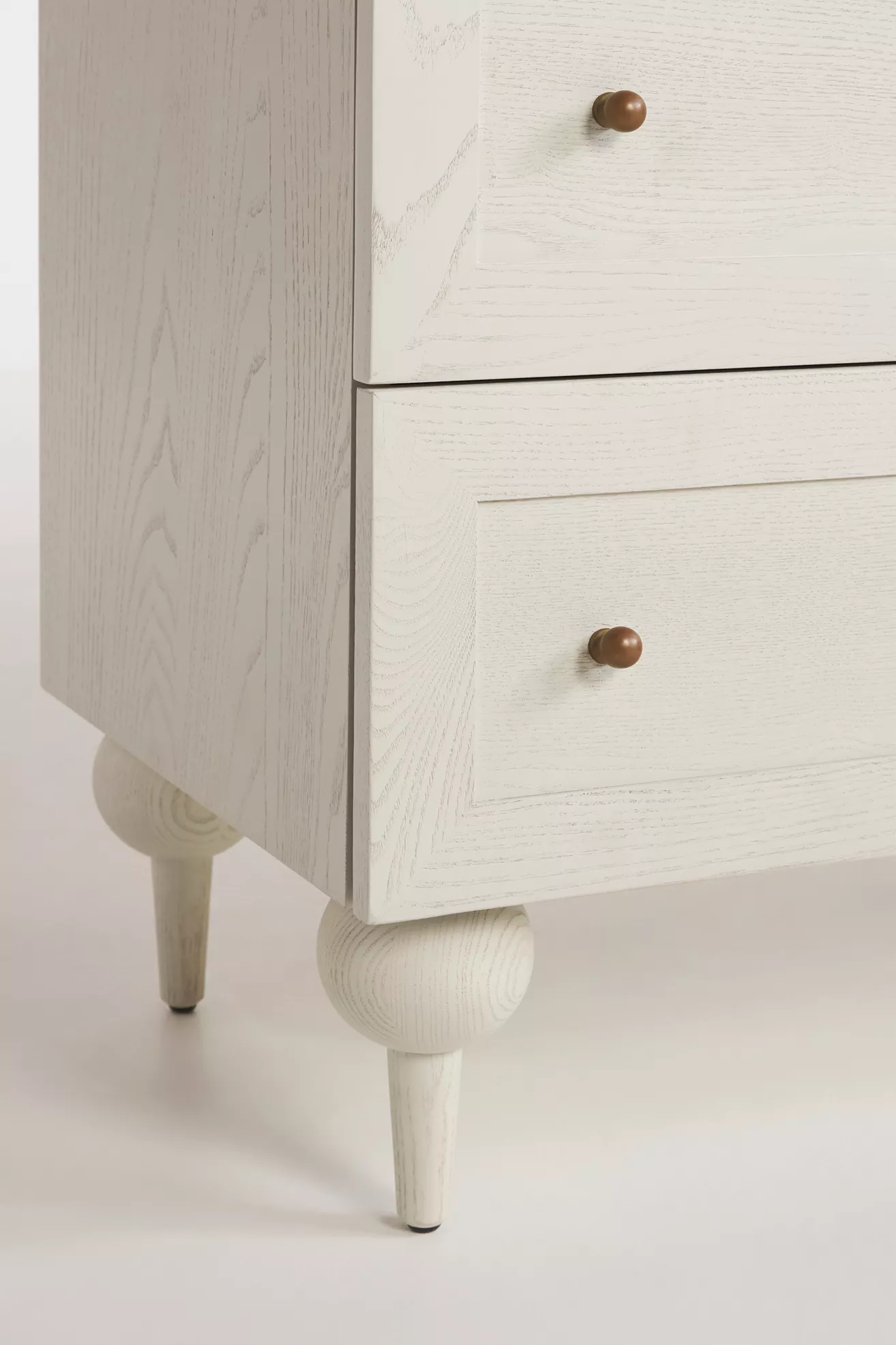 Close-up of wood texture and drawer drawer knob
