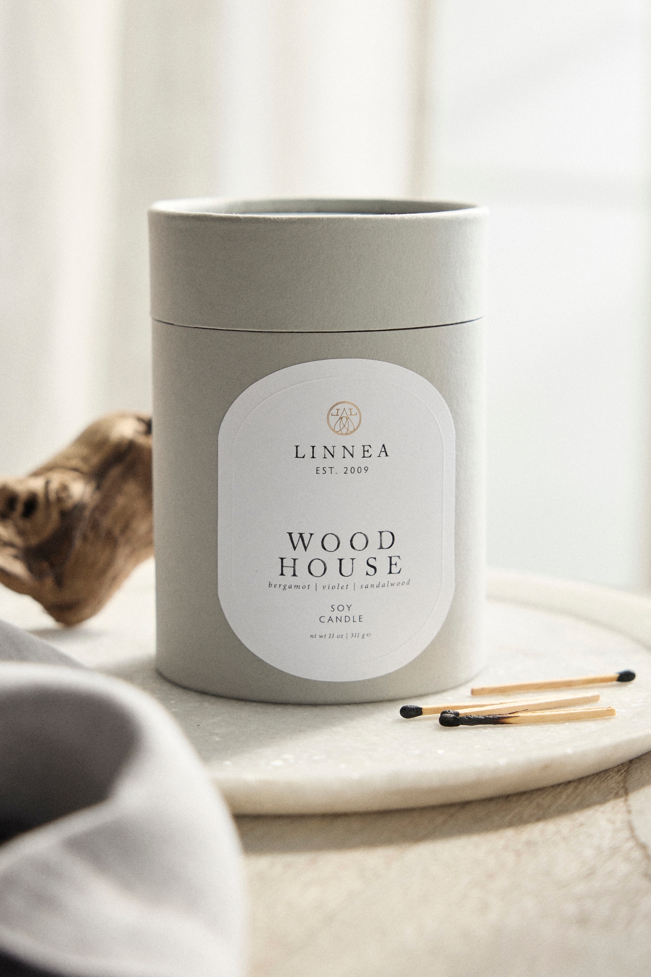 Linnea Candle, Wood House