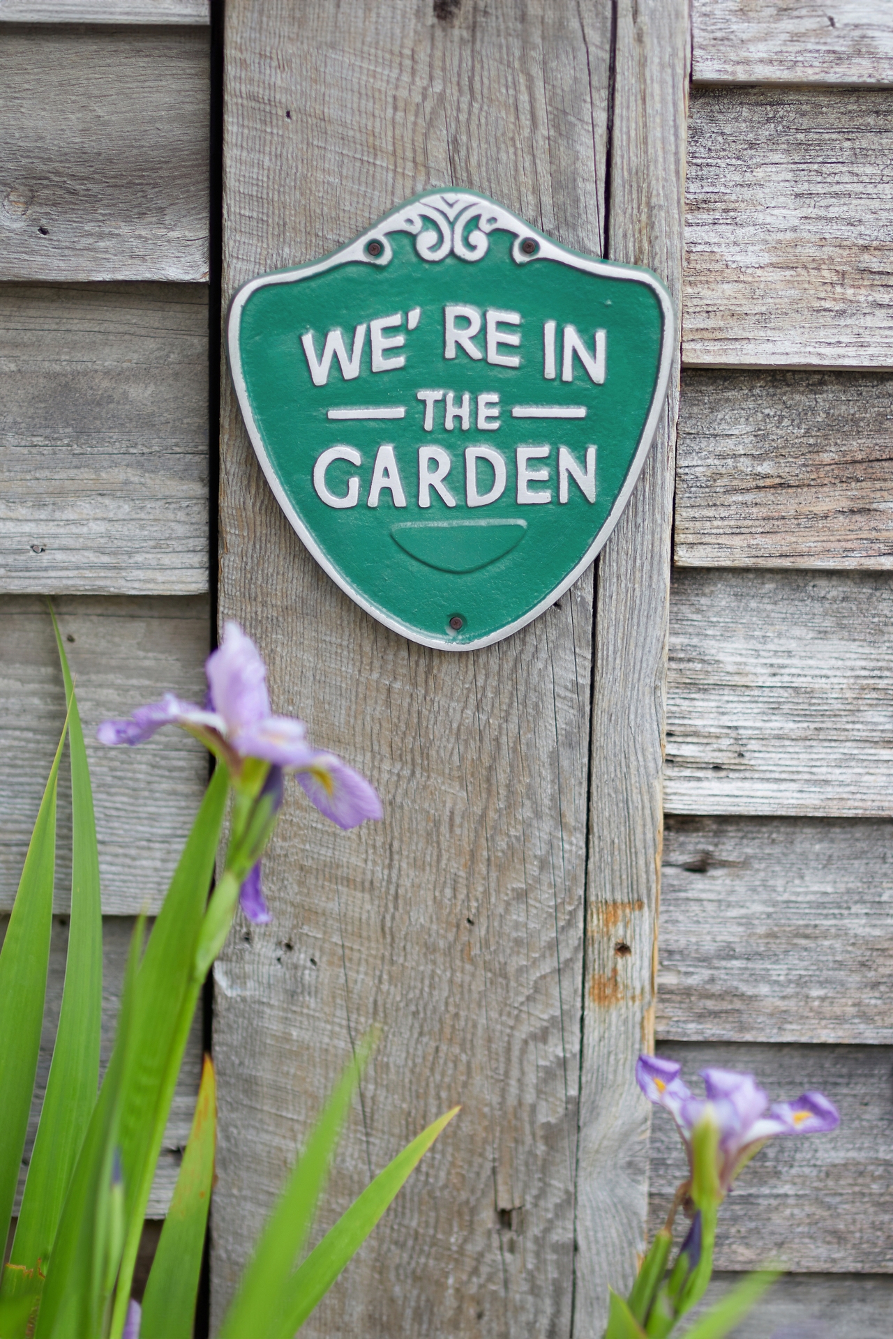 Iron We're in the Garden Sign