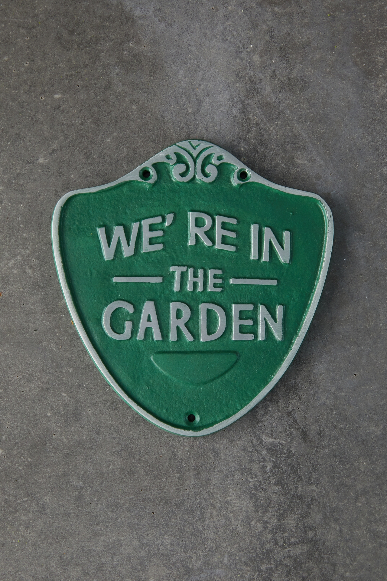 Iron We're in the Garden Sign