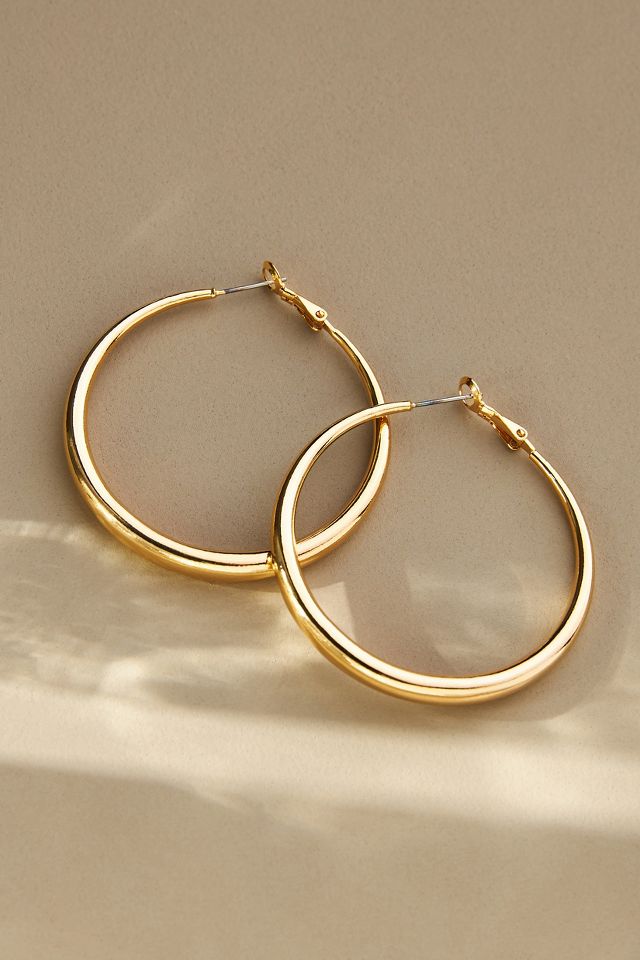 Anthropologie gold shop hoop earrings