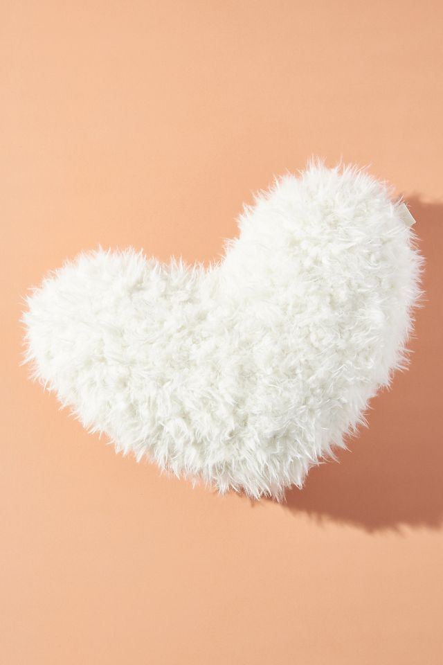 Therapeutic heart outlet pillow