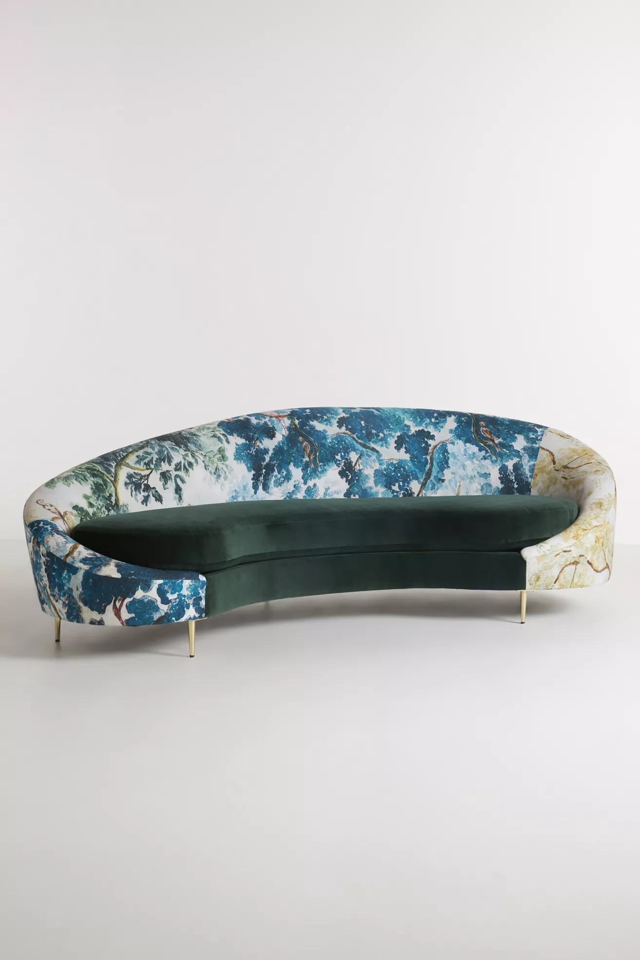 Front-left view of sofa showing curved section and print
