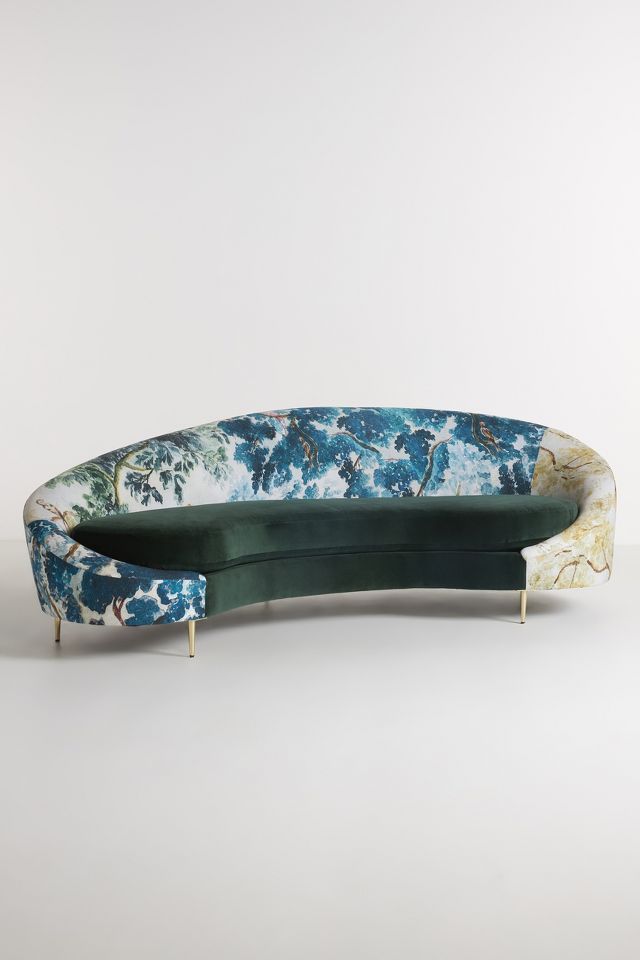 Asymmetrical store serpentine sofa