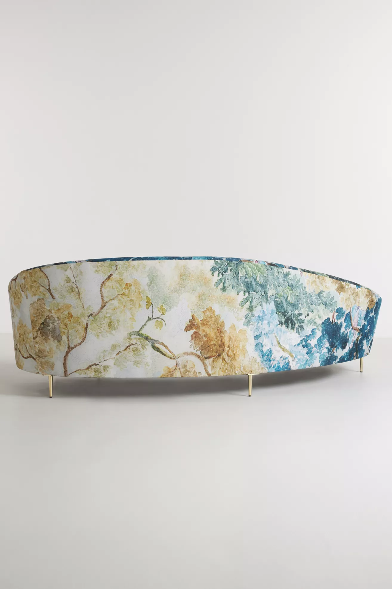 Side view of the sofa showing print wrap and leg