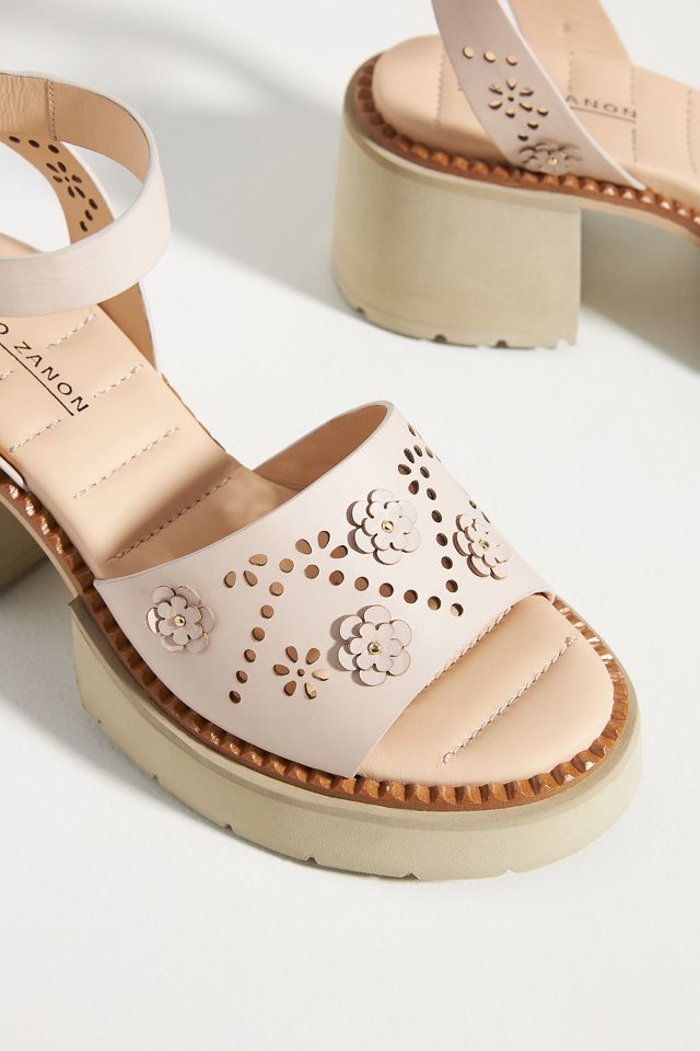 Derechie perforated hot sale shield sandal