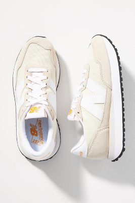 Anthropologie New Balance Silver 574 Sneakers