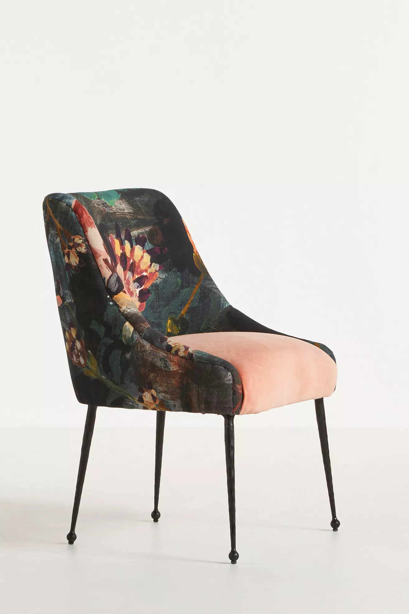 Side angle of velvet floral dining chair