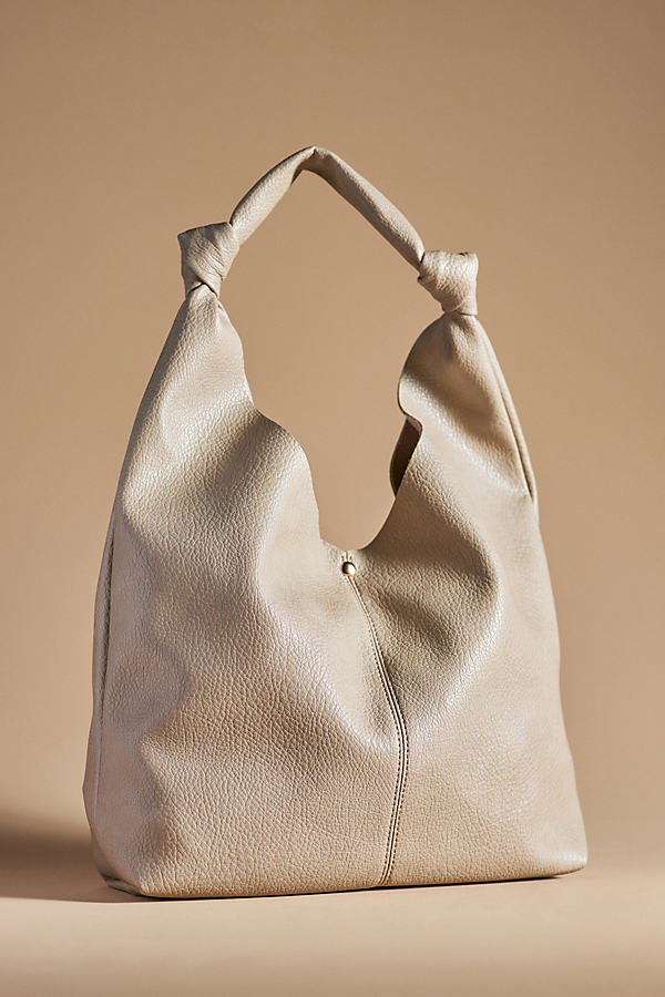 By Anthropologie The Love Knot Faux Leather Bag In Beige