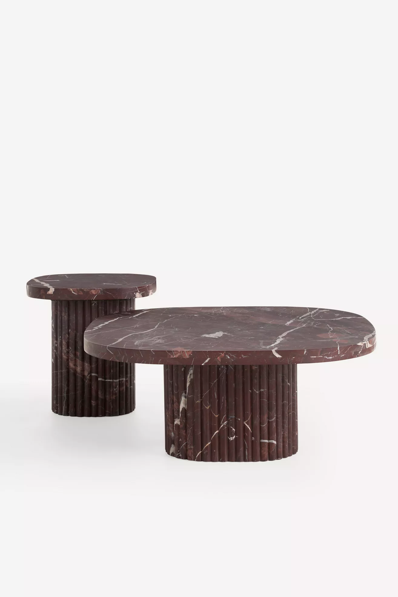 Two Kanta marble side tables in wedding arrangement showing different sizes