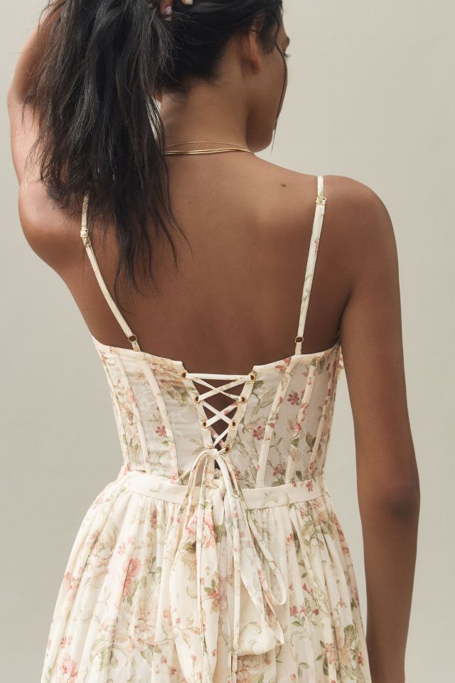 Our Carmen dress features a lace up back so you can cinch your