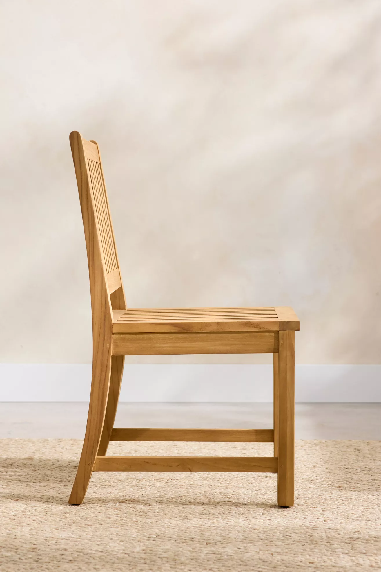 Side profile of teak chair