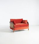 Heatherfield chair front three-quarter view in coral-red upholstery