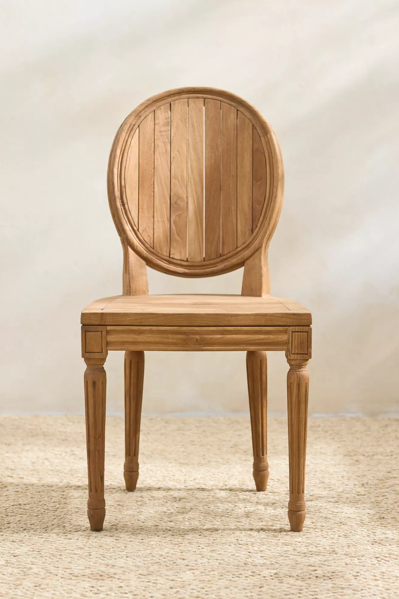 Back view of oval-back chair with vertical slats